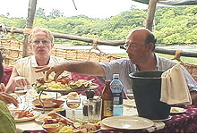 Guests having lunch on the Tamarind Dhow as they Cruise