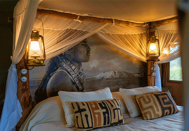 campi-ya-kanzi-camp-luxury-tented-safari-camp-inside-each-tent-has-a-wooden-framed-double-bed-or-twin-beds Campi ya Kanzi Camp Chyulu Hills Tsavo West National Park Kenya