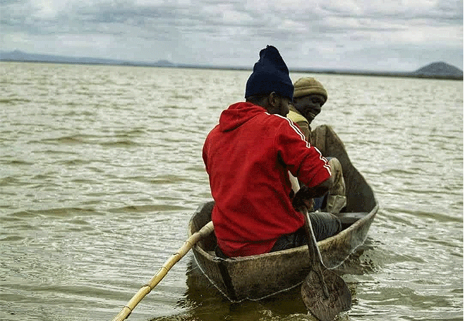 lake-jipe-eco-lodge-local-fishermen-sail-away-into-the-saline-lake Lake Jipe Eco Lodge Tsavo West National Park Kenya