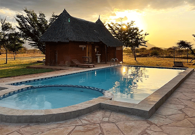 lake-jipe-eco-lodge-sunset-view-from-the-pool-area Lake Jipe Eco Lodge Tsavo West National Park Kenya