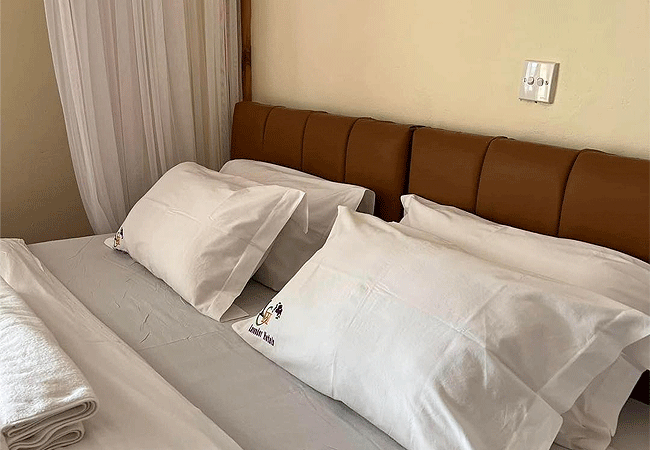 lavender-gardens-hotel-wundayi-rooms-have-a-bed-mosquito-net-small-bathroom-with-a-shower-and-toilet Lavender Gardens Hotel Wundanyi Taita Taveta Country Kenya
