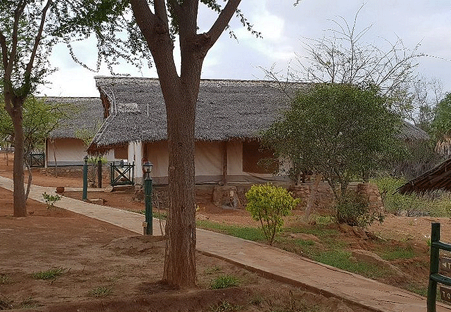 man-eaters-lodge -tsavo-national-park-offers-a-lodge-with-a-swimming-pool-with-a-view- sauna-sun-terrace-and-a- beautiful-garden Man Eaters Lodge Tsavo West National Park