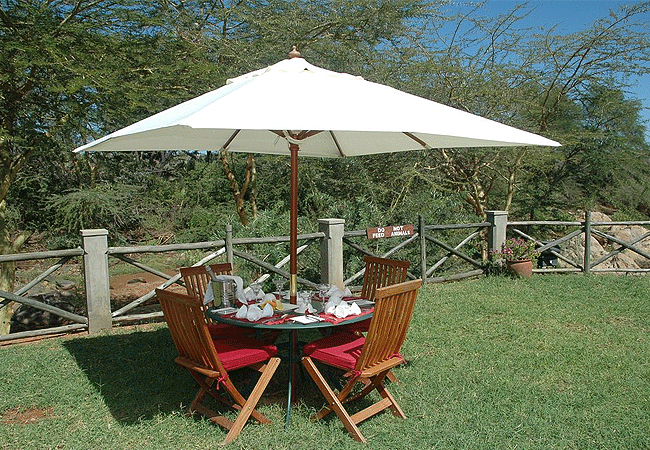 man-eaters-lodge -tsavo-national-park-sitting-area-with-the-view-of-tsavo-river Man Eaters Lodge Tsavo West National Park