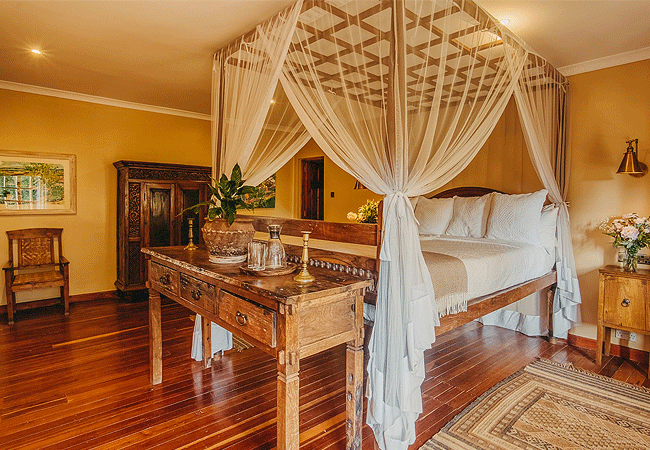 mukima-manor-laikipia-guest-rooms-with-expansive-views-out-to-the-botanical-gardens-and-pools Mukima Manor Boutique Hotel & Nature Sanctuary