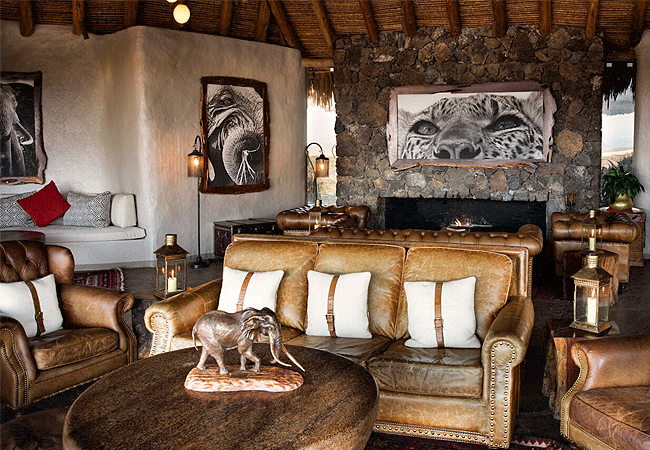 ol-donyo-lodge-chyulu-hills-a-luxurious-and-comfortable-lounge-area-that-offers-stunning-views-of-mount-kilimanjaro Ol Donyo Lodge Chyulu Hills Kenya Safari