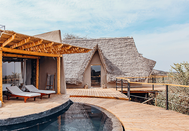 ol-donyo-lodge-chyulu-hills-boasts-luxurious-suites-each-featuring-a-private-plunge-pool-and-a-rooftop-terrace-with-a-star-bed-for-sleeping-under-the-african-sky Ol Donyo Lodge Chyulu Hills Kenya Safari