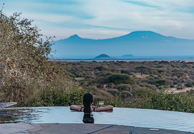 ol-donyo-lodge-chyulu-hills-has-a-large-infinity-pool-at-the-main-lodge Ol Donyo Lodge Chyulu Hills Kenya Safari