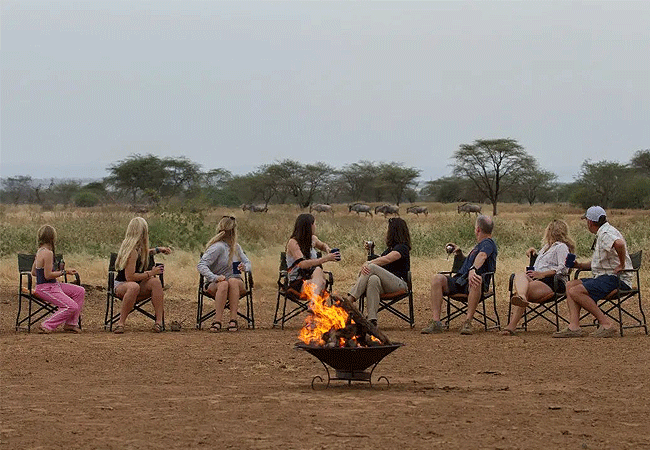 shompole-wilderness-camp-waterhole-lionssundowners Shompole Wilderness Camp