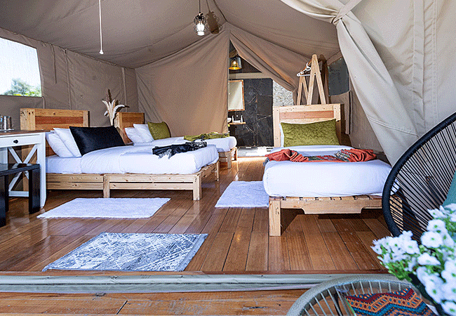 sleeping-warrior-camp-lake-elementaita-moran-triple-tents-are-designed-using-canvas-thereby-providing-a-cozy-retreat Sleeping Warrior Camp Lake Elementaita