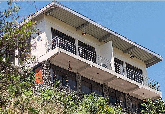 sleeping-warrior-camp-lake-elementaita-nelion-cabin-sleeps-2-guests-has-a-bed-bathtub-with-stunning views-and-a-sitting-area Sleeping Warrior Camp Lake Elementaita