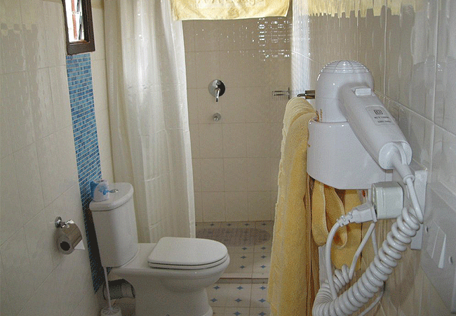aa-lodge-amboseli-national-park-bathrooms-are-en-suite-with-a-toilet-shower-and-basin AA Lodge Amboseli National Park Kenya Safari