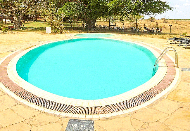 ashnil-aruba-lodge-tsavo-east-national-park-pool-area-is-well-furnished-with-sun-beds-&-towels Ashnil Aruba Lodge Tsavo
