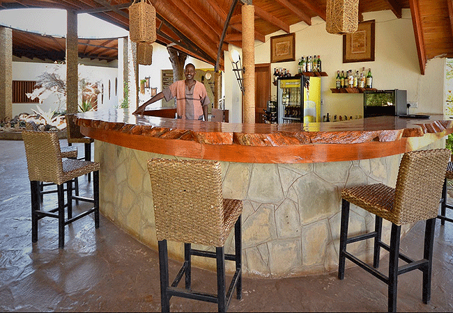 ashnil-samburu-camp-is-a-luxury-tented-camp-located-by-the-spectacular-backdrop-of-the-mighty-olokwe-mountain-and-sitting-alongside-the-ewaso-nyiro-river Ashnil Samburu Camp Kenya Safaris