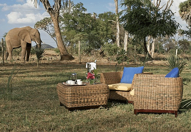 ashnil-samburu-camp-outdoor-seating-area-offer-views-of-the-african-savannah Ashnil Samburu Camp Kenya Safaris