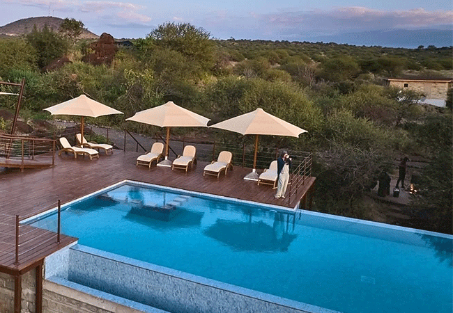 elephant-gorge-camp-amboseli-national-park-infinity-pool-with-a-view- overlooking-a-waterhole-visited-by-elephants-with-mt-kilimanjaro-as-a-stunning-backdrop Elephant Gorge Camp Amboseli