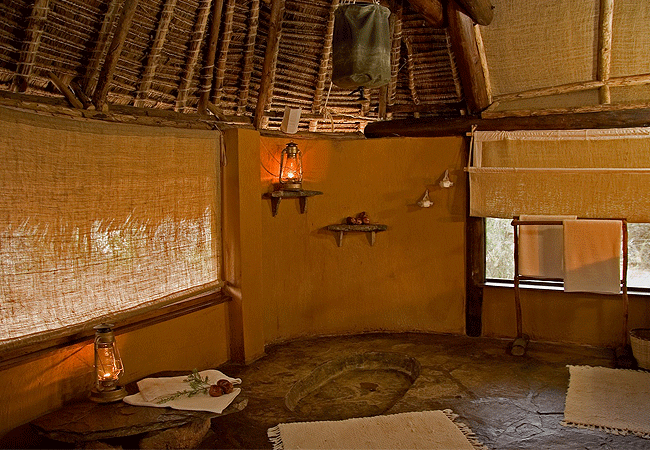 galdessa-camp-tsavo-east-national-park- features-traditional-bucket-showers-basins-with-running-water-and-flush-toilets-in-their-en-suite-bathrooms Galdessa Camp Tsavo East National Park