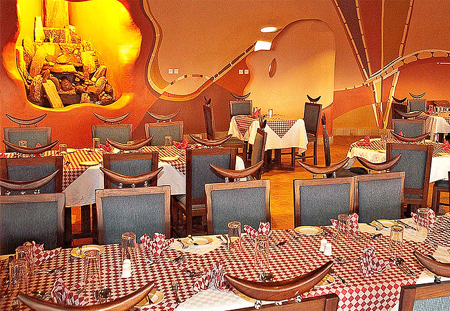 samburu-sopa-lodge-has-an-open-air dining-area-which-overlooks-the-waterhole-enhancing-the-dining-experience-with-potential-wildlife-sightings Samburu Sopa Lodge Samburu National Reserve