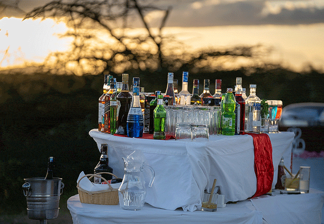 sarova-shaba-game-lodge-samburu-river-sundowners-drinks-and-cocktails-are-served-at-site-offering-stunning-views-of-the-sunset-over-the-meandering-river-and-the-wilderness Sarova Shaba Game Lodge Samburu National Reserve & Shaba Game Reserve