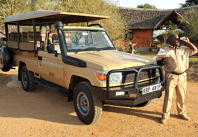 satao-safari-camp -tsavo-east-national-park-open-sided-game-drive-vehicle Satao Safari Camp Tsavo East National Park