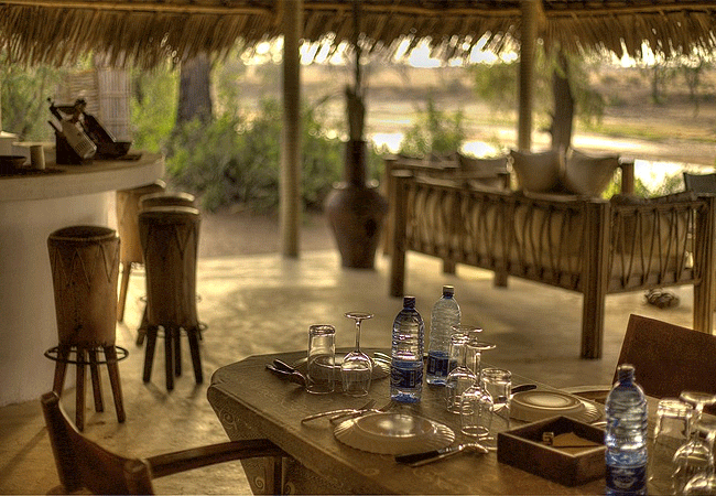 shoroa-river-camp-tsavo-east-national-park-dining-features-a-restaurant-on-a-spacious-veranda-overlooking-the-river-offering-both-international -and-african-inspired-meals Shoroa River Camp Tsavo East National Park Kenya
