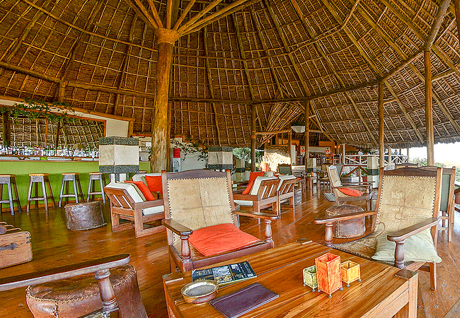 tortilis-camp-amboseli-national -park-guest-areas-of-the-camp-include-a-cosy-sitting-room-bar-and-dining-area-all-exquisitely-furnished-with-natural-materials-and-covered-with-thatched-roofs Tortilis Camp Amboseli National Park | Prices | Facilities & Activities