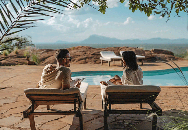 honeymoon-safaris-holidays-at-kipalo-hills-lodge-tsavo-west-national-park-pool-offers-stunning-views-overlooking-a-waterhole-which-attracts-wildlife Honeymoon Safaris Holidays
