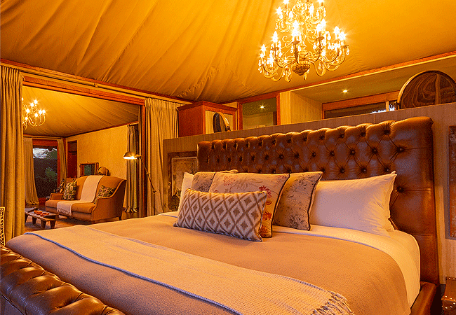 finch-hattons-camp-presidential-suite-tsavo-west-national-park-has-a-large-bedroom-and-an-en-suite-bathroom-a-half-kitchen-for-butler-service-and-a-sitting-room-with-a-guest-toilet Finch Hattons Camp Presidential Suite