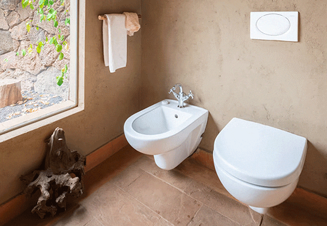 severin-safari-camp-junior-suites-feature-en-suite-bathrooms-with-a-separate-toilet-and-bidet- alongside-a-shower-and-running-hot-and-cold-water Severin Safari Camp Junior Suites Tsavo West National Park