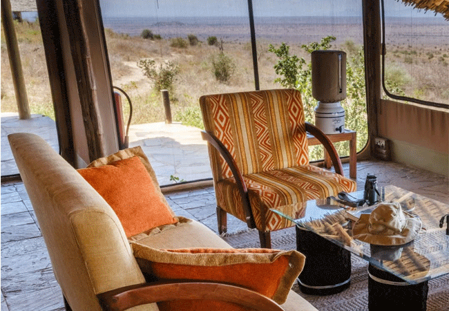 soroi-cheetah-tented-camp-lumo-conservancy Tsavo-tsavo-west-national-park-lounge-is-a-cozy-and-inviting-space-for-guests-to-relax-and-socialize Soroi Cheetah Tented Camp Tsavo West National Park Kenya