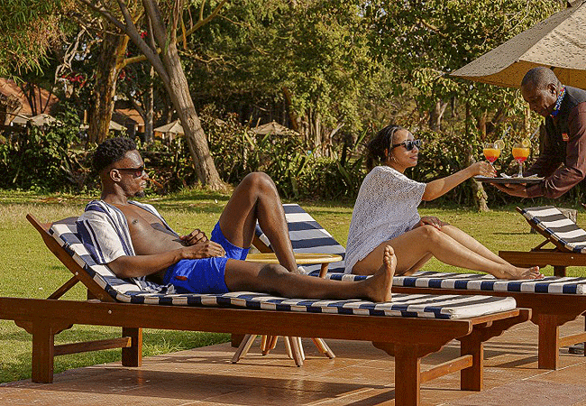 muthu-lake-naivasha-country-club-features-a-scenic-outdoor-swimming-pool-area-complete-with-premium-sun-loungers-poolside-seating-lounges-and-protective-umbrellas Muthu Lake Naivasha Country Club