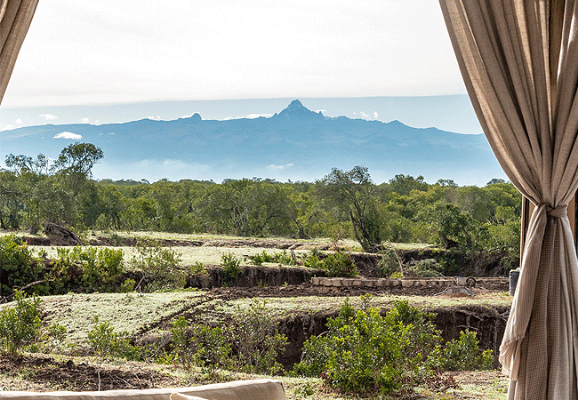 the-river-camp-in-the-ol-pejeta-conservancy-offers-panoramic-views-of-the-tranquil-ngobit-river-with-mount-kenya-rising-on-the-horizon The River Camp Ol Pejeta Conservancy Laikipia