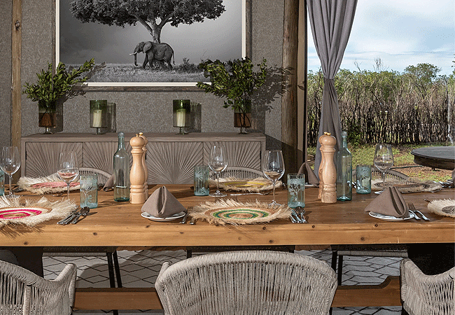 the-river-camp-ol -pejeta-conservancy-laikipia-kenya-dining-area-is-an-open-air-dining-pavilion-built-on-raised-timber-decks-along-the-ngobit-river The River Camp Ol Pejeta Ol Pejeta Conservancy Laikipia