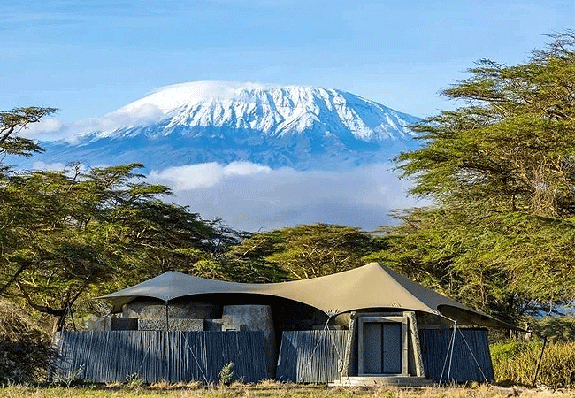 angama-amboseli-luxury-safari-lodge-with-kiliamjaro-in-the-back-drop Angama Amboseli Luxury Safari Lodge