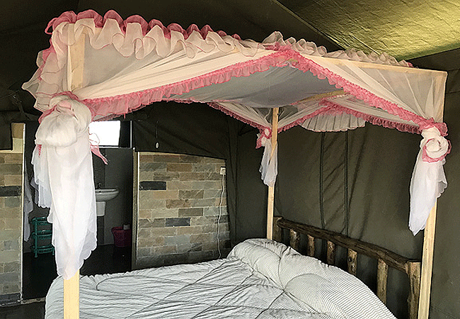 manjaro-tented-camp-amboseli-national-park-double-bed Manjaro Tented Camp Amboseli National Park