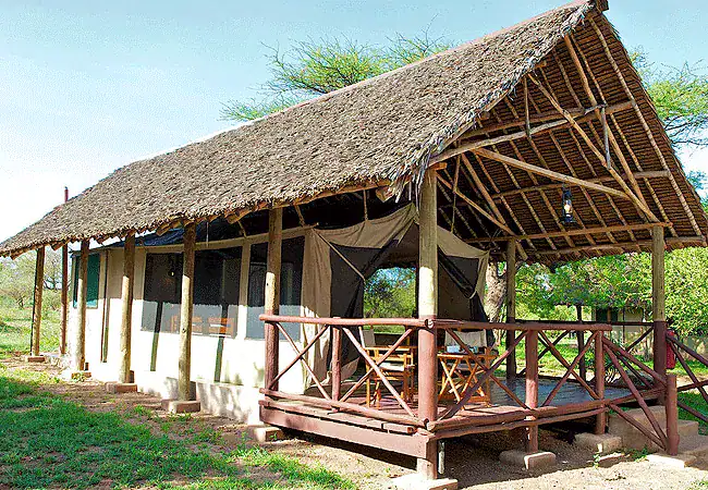 3-day-ngutuni-lodge-ziwani-voyager-camp-safari-voyager-ziwani-camp-has-25-tents-strung-out-along-paved-walkways-each-with-views-across-the-dam-and-mount-kilimanjaro-in-the-background 3 Day Ngutuni Lodge & Ziwani Voyager Camp Safari