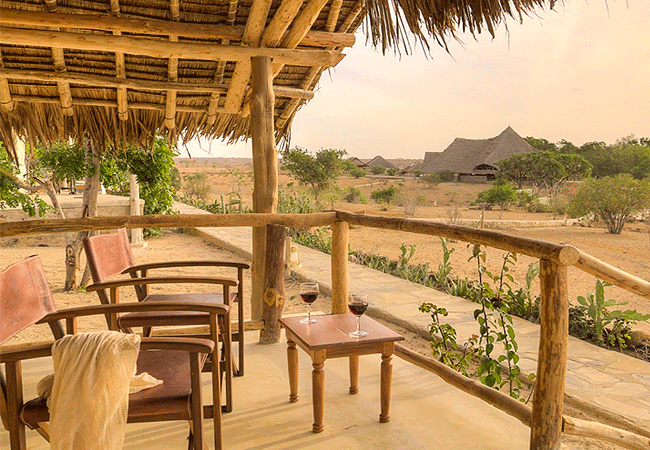 kudu-safari-camp -tsavo-east-national-park-tents-have-solid-stone-floors-are shaded-by-makuti-thatched-roofs-and-verandas-with-views-of-the-river Kudu Safari Camp Tsavo East National Park