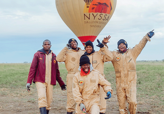 balloon safari crew typically includes a pilot and a chase crew Nyssa Balloon Safaris Tanzania