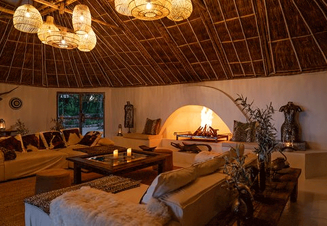 manzili-house-maasai-mara-cosy-bedroom-with-a-fire-place Manzili House, Maasai Mara