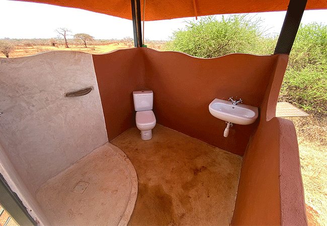 ngulia-rhino-sanctuary-tsavo-west-viewing-platforms-is-small-(6m x 6m)-raised-10ft-off-the-ground-private-and-has-basic-amenities-such-as-a-toilet-shower-and-wash-basin-with-running-water Ngulia Rhino Sanctuary Tsavo West National Park