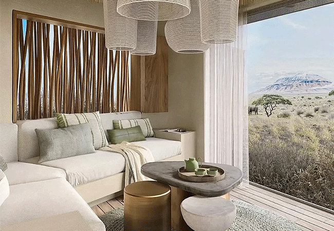 ak-sanctuary-kitirua-plains-lodge-bedrooms-have-king-size-beds-ensuite-bathrooms-and-theres-a-lounge-area-and-outdoor-deck-for-scenic-relaxation A&K Sanctuary Kitirua Plains Lodge