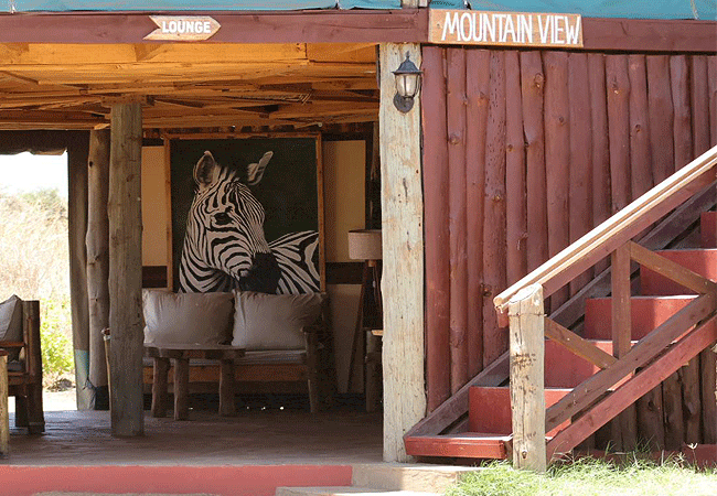 amboseli-discovery-camp-has-beautiful-lounge-with-an-elevated-platform-for-spectacular-view-of-mt-kilimanjaro-and-a-busy-watering-hole-nearby Amboseli Discovery Camp | Amboseli National Park | Prices & Activities