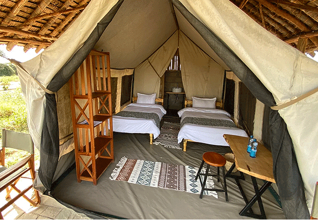 amboseli-discovery-camp-tents-have-a-covered-veranda-with-classic-safari-chairs-and-table-for-your-comfort Amboseli Discovery Camp | Amboseli National Park | Prices & Activities