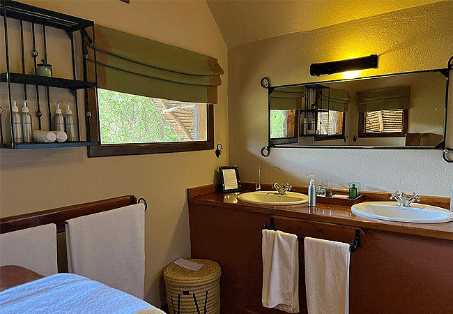 elewana-tortilis-camp-family-tent-amboseli-national-park-is-all-spacious-with-king-or-twin-beds-and-elegant-en suite-bathroom Elewana Tortilis Camp Family Tent Amboseli National Park Kenya
