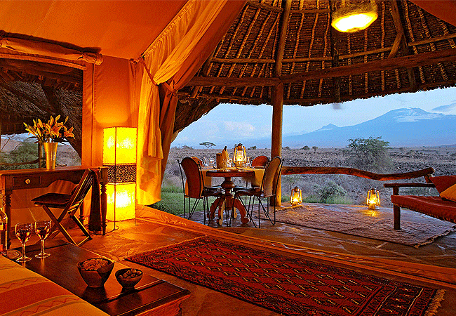 elewana-tortilis-camp-family-tent-amboseli-national-park-is-separate-from-the main-camp-and-perched-on-a hill with a-shared-pool-provide-an-ideal-retreat Elewana Tortilis Camp Family Tent Amboseli National Park Kenya