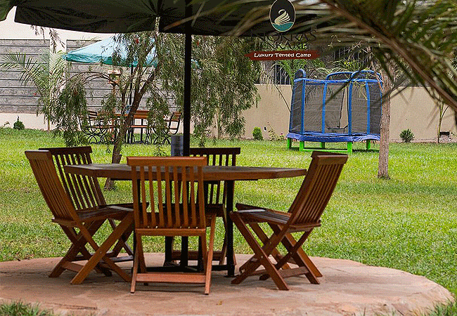 nokras-enkare-luxury-tented-camp-outside-sitting-and-lounge-areas- blend-modern-comfort-with-the-natural-forest-surroundings Nokras Enkare Luxury tented camp