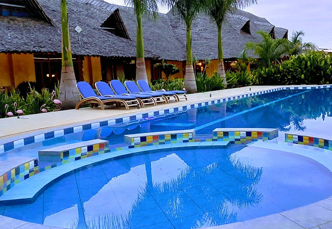the-last-village-lodge-in-athi-river-features-16-elegantly-designed-rooms-infused-with-a-swahilicoastal-architectural-theme-and-an-expansive-outdoor-swimming-pool-and-a-childrens-pool The Last Village Lodge on Mutungoni Road in Athi River