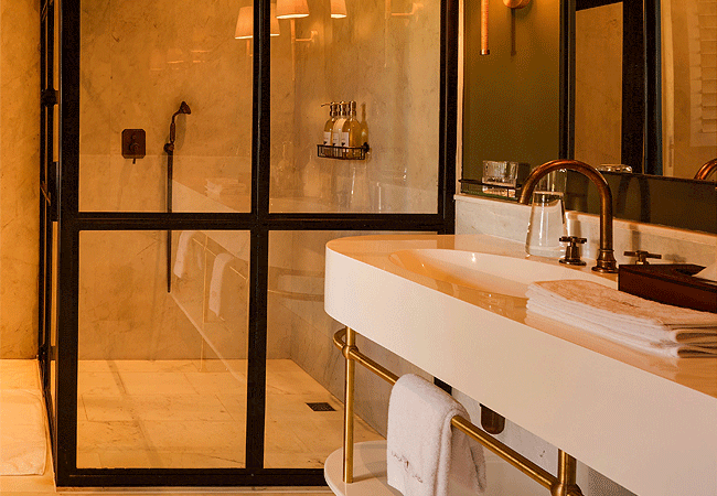 laba-ngorongoro-lodge-features-modern-en-suite-bathrooms-equipped-with-a-bathtub-a-separate-shower-and-underfloor-heating Laba Ngorongoro Lodge